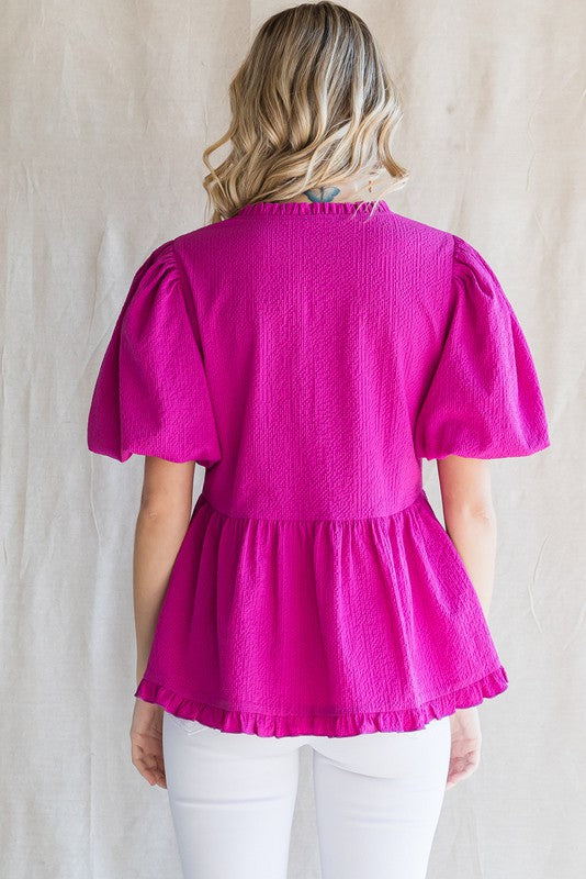 Textured Fabric Peplum Top In Magenta