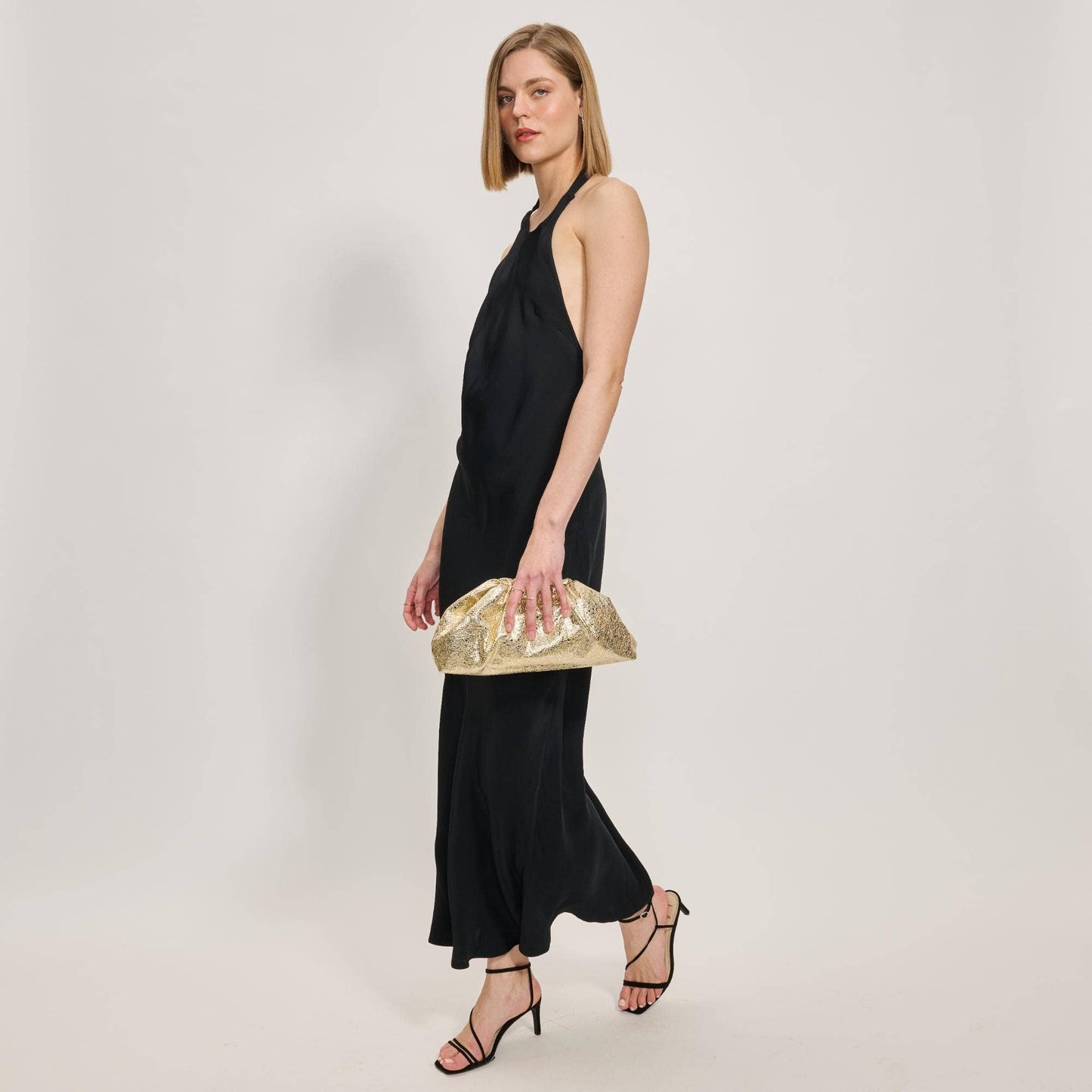 Elegance in Motion Crossbody Handbag: Gold