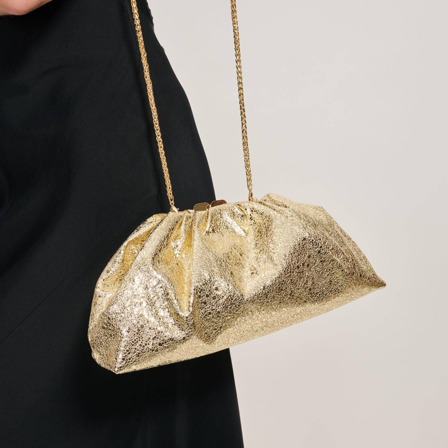 Elegance in Motion Crossbody Handbag: Gold